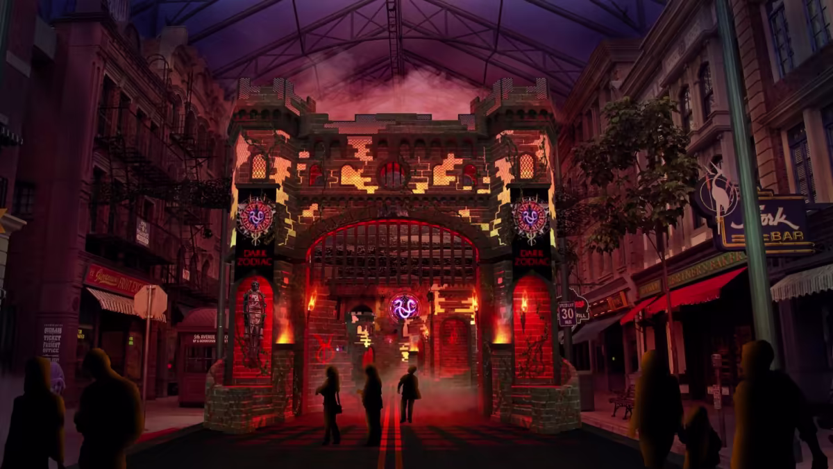  Cổng vào khu vực chủ đề 'Dark Zodiac' tại Universal Studios Singapore, được trang trí bằng đèn đỏ và biểu tượng kinh dị,